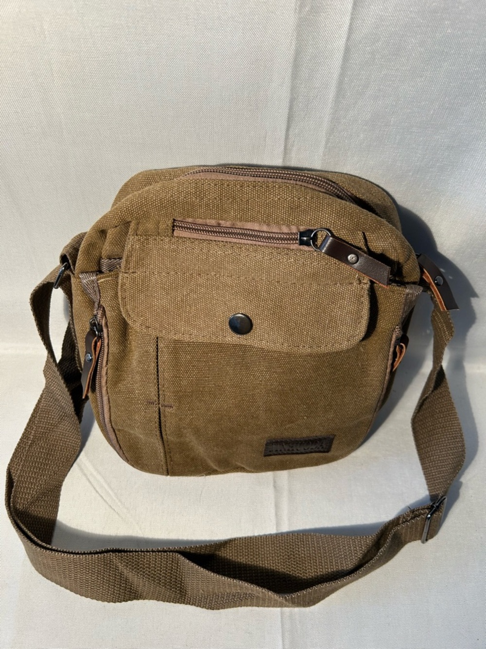 Canvas Crossbody Khaki Bag for Men compact size of approximately 9”x9”